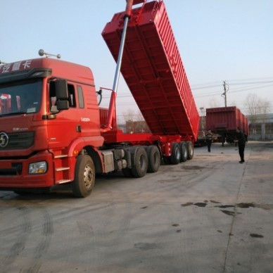 出口一体九米自卸后翻半挂车