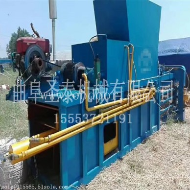 纸皮压块机多少钱   压废纸箱的机器图片